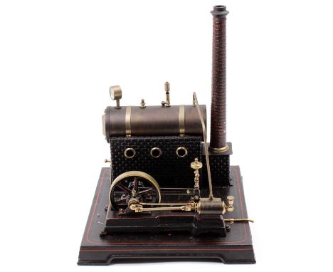 Doll et Cie stationary steam plant, comprising of horizontal tinplate brickwork housed boiler with sight glass and steam gaug