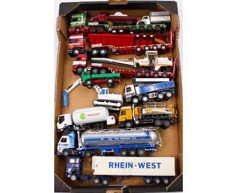 A tray of mixed modern issue 1/50th scale trucks, with examples including a Tekno Mercedes Actross Tanker Truck, a Cursor Mod