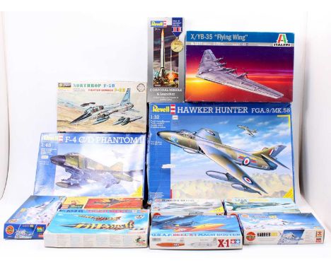 A box containing 12 mixed aircraft kits, with examples including a Revell 1/48th scale F-4 C/D Phantom II, an Italeri 1/72nd 