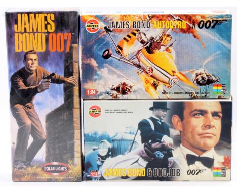 A collection of James Bond related plastic kits to include a Polar Lights James Bond 007 action figure kit, an Airfix 1/12 sc