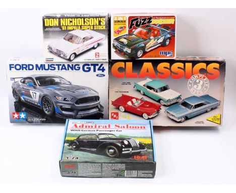 A collection of 1/24th and 1/25th scale car kits comprising a Tamiya Ford Mustang GT4, an MPC 1980 Plymouth Volare Road Runne