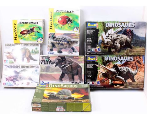 A collection of 9 various boxed dinosaur related plastic kits to include Revell, Tamiya, Heller and others, to include a Reve