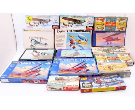 A collection of 15 mixed aircraft kits with examples including a Revell 1/48th scale Fokker Dr. 1 Triplane, a Curtiss 1/32nd 