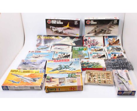 A collection of mostly Airfix military aircraft and figures kits, with specific examples including an Airfix 1/72nd scale Boe