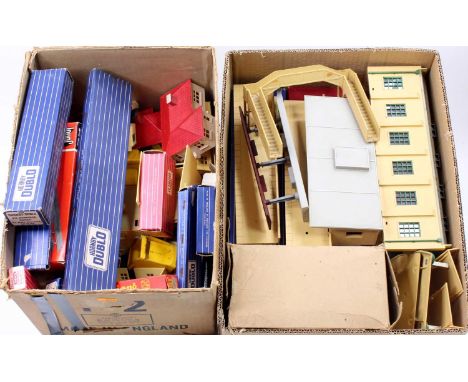 Two trays containing a collection of mixed Hornby Dublo and associated lineside accessories, switches, points and empty boxes