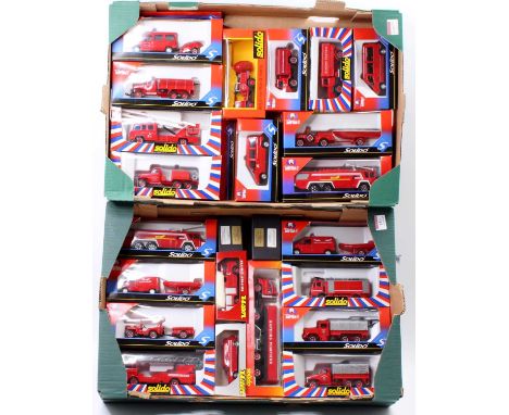 Two trays containing a collection of Solido, Verem, and BW Models diecast and white metal model kits, to include a Solido Ren