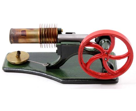 Roland Reichelt single cylinder hot air engine, comprising of single cylinder and single heat exchanger, powering a 11cm spok