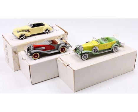 A collection of three various boxed Franklin Mint 1/24 scale diecast vehicles to include a Gary Cooper Duzenberg, a Danbury M