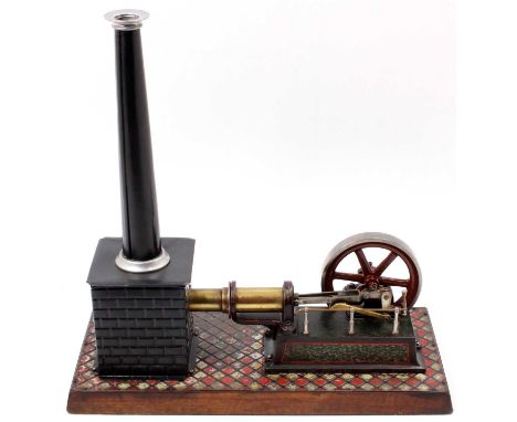 Bing, Circa 1906 and later restored stationary hot air engine, comprising of single cylinder with 4 inch spoked fly wheel, he