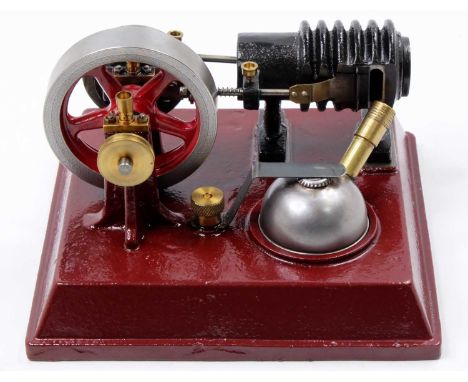 A Floyd Mcguckin (Popular Science Magazine, February, 1950) stationary horizontal vacuum engine, comprising heavy cast base w