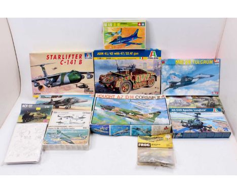 One box containing 12 various mixed scale military themed aircraft, and a military vehicle kit to include Zvezda, Tamiya, Esc