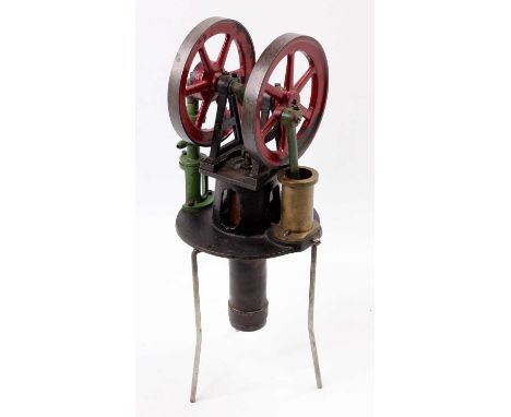 Heinrici of Germany vertical hot air engine water pump, comprising twin spoked flywheels measuring 5 3/4" diameter, ball and 