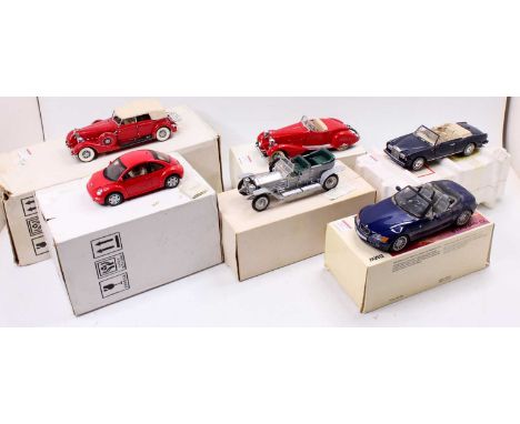 A collection of six Franklin/Danbury Mint and UT Models 1/24 scale incomplete diecast vehicles to include a Volkswagen New Be