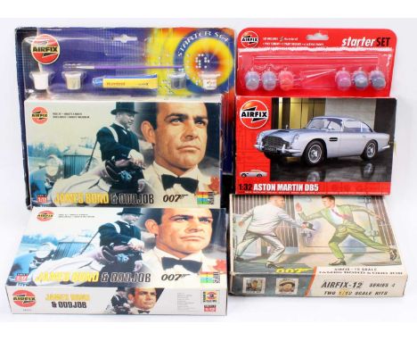 One tray containing four boxed Airfix 007 related plastic kits to include James Bond and Oddjob, an original Airfix-12 scale 