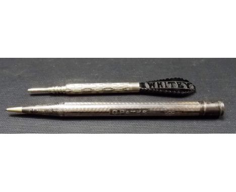 Silver yard-o-led engine turned propelling pencil; together with another propelling pencil with Whitby jet finial (2)