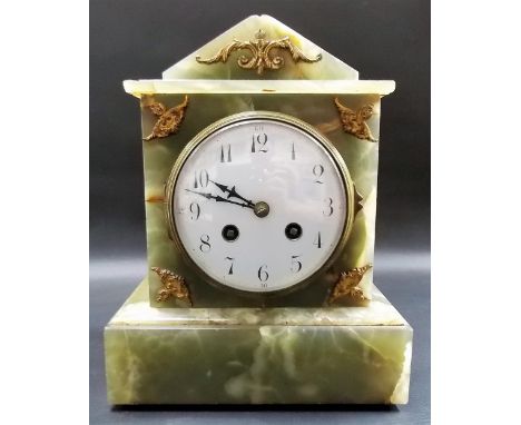French 8-day clock, the 4' white enamel dial with Arabic Numerals, the Samuel Marti movement striking on a gong, within archi
