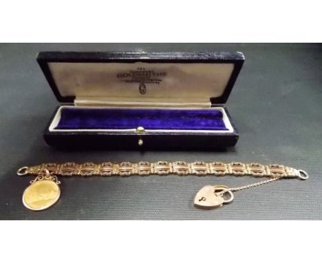 9ct fancy gate link bracelet with heart shaped padlock and 1887 shield back half sovereign, weight overall 24gms approx.
