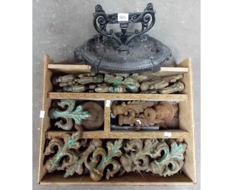 Victorian cast iron boot scraper; together with a collection of cast iron railing finials.