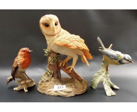 Coalport Danbury Mint porcelain model of a barn owl; together with two Goebel bird figures