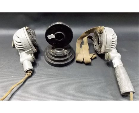 Two WWII era aircraft microphones; together with a black metal & celluloid battery operated speaker, stamped W-26 4001 No. 1 