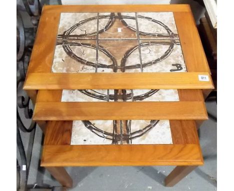 Retro Danish teak tile top nest of three tables, the underside stamped Trioh Made in Denmark, width 24.5".