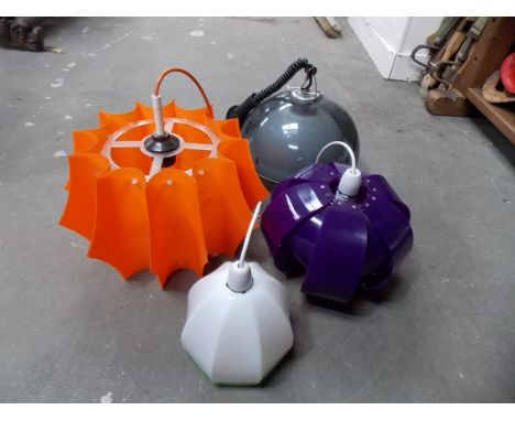 Three retro PVC pendant light fittings; together with another in glass (four).