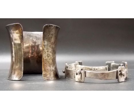 Modern 925 silver bangle; together with a mid-century style white metal heavy bangle stamped 999.8, weight 164g approx (2)