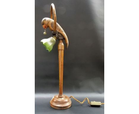  20th Century oak carved novelty table lamp base, carved as a parrot with glass inset eyes, a ring with a bell in its mouth, 