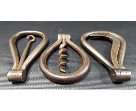 Three steel folding pocket tools, a can opener, button hook & corkscrew