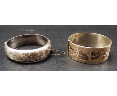 Victorian silver foliate engraved bangle, Chester 1884; together with another silver bangle, Birmingham 1919, weight overall 