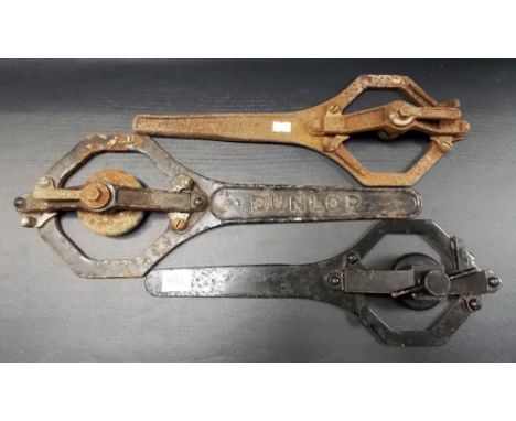 Two Dunlop wheel nut spanners, the largest length 18.5"; together with one other wheel nut spanner (3)