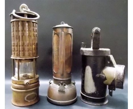 An American copper miners safety lamp by Wolf Safety Lamp Co, New York, height 12"; together with an inspection lamp by CEAG 