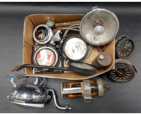 Box of vintage car parts inc. an A.T. speedometer, RPM x10 dial, Marchal lamp etc