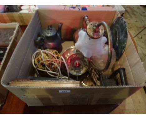 A box containing brass table lamp, copper kettles, an early 19th century snuff box, a framed and glazed Stevengraph entitled 