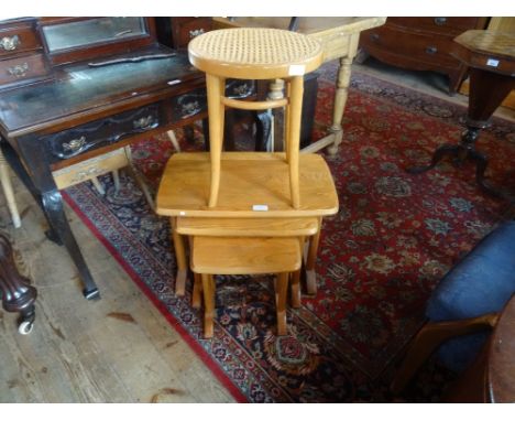A set of three modern nesting tables, the largest 62cm wide, together with a modern floor standing full length swing mirror a