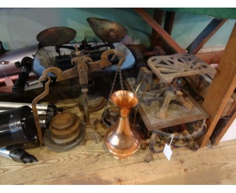 A large quantity of metalware, to include: weighing scales, a trivet, a copper jug and other items.