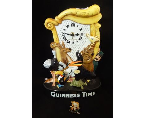 A Royal Doulton limited edition Guinness Anniversary clock, MCL26, no. 134/350, modelled by Shane Ridge, with original box an