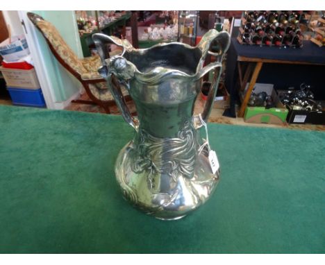 A large silvered Art Nouveau vase, inscribed J. R. Hannig, having stylized maiden and leaf decoration in shallow relief, 36cm