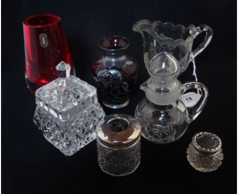 A Whitefriars ruby coloured spill vase, together with two cut glass dressing table jars, having silver mounts and four other 