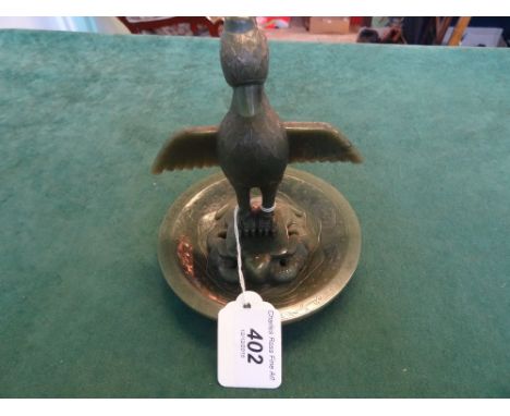 A spinach jade dish modelled with carved with a bird standing on the back of a turtle, 15cm tall. Condition Report: Generally