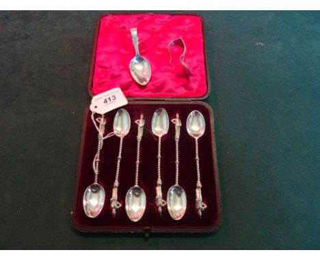 A cased set of six teaspoons, London hallmarks, each having military finials, together with a Continental silver caddy spoon 