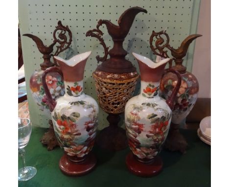 A large Continental ceramic and metalware ewer, having pierced body decoration with majolica-style glaze, 54cm, together with