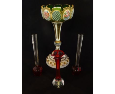 A late 19th/early 20th century green glass table centre, decorated in the Bohemian manner with hand painted reserves of flora