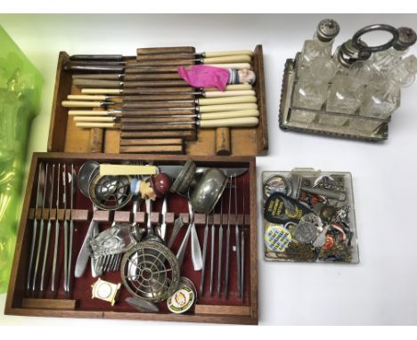 A large collection of various cutlery and other oddments including condiments and enamel badges. NO RESERVE.