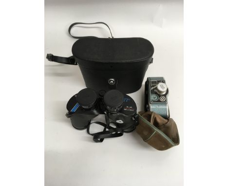 A pair of Saratoga MKII binoculars and a Bauer BBC cine camera - NO RESERVE