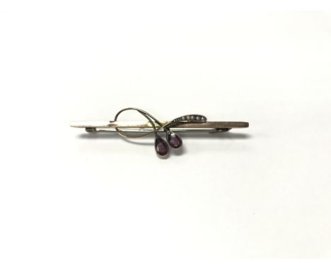 A 9ct gold bar brooch set with amethyst and seed pearl. Weight approx 3g - NO RESERVE