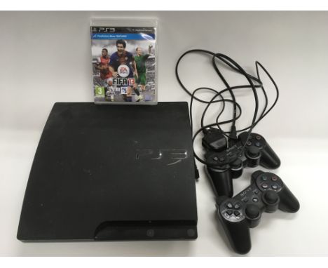 A Playstation 3 console and two controllers and a FIFA 13 game. NO RESERVE.