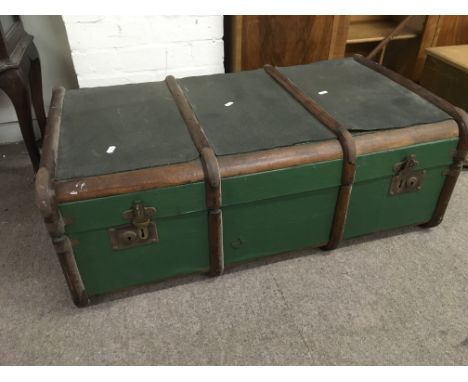 A wood bound travelling trunk, approx 91cm x 51.5cm x 33cm.