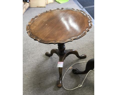 A mahogany standard lamp and a mahogany occasional table