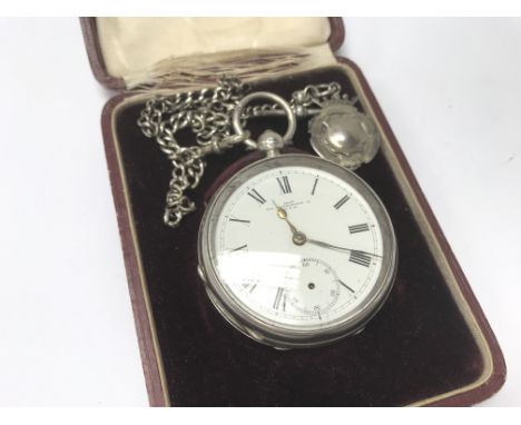 A Silver cased button wind pocket watch with attached watch chain, the watch with makers inscription to the dial The Farringd